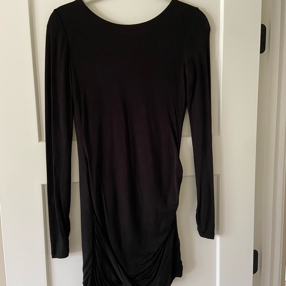 BCBG formal dress. Like new condition. Fitted with beautiful low back. Size S